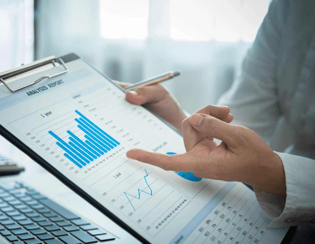 A person is working on a spreadsheet.